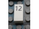 Part No: Mx1021Apb31  Name: Modulex, Tile 1 x 2 with Black Calendar Day Number '12' Pattern