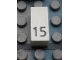 Part No: Mx1021Apb34  Name: Modulex, Tile 1 x 2 with Black Calendar Day Number '15' Pattern