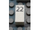 Lot ID: 32974622  Part No: Mx1021Apb41  Name: Modulex, Tile 1 x 2 with Black Calendar Day Number '22' Pattern