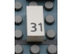 Part No: Mx1021Apb50  Name: Modulex, Tile 1 x 2 with Black Calendar Day Number '31' Pattern