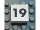 Part No: Mx1022Apb122  Name: Modulex, Tile 2 x 2 (no Internal Supports) with Black Calendar Week Number 19 Pattern