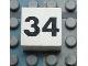 Part No: Mx1022Apb137  Name: Modulex, Tile 2 x 2 (no Internal Supports) with Black Calendar Week Number 34 Pattern