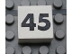 Part No: Mx1022Apb148  Name: Modulex, Tile 2 x 2 (no Internal Supports) with Black Calendar Week Number 45 Pattern