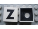 Lot ID: 190829302  Part No: Mx1022Cpb25  Name: Modulex, Tile 2 x 2 with Black 'Z' Pattern (Black internal lining with White dot)