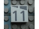 Part No: Mx1022Apb167  Name: Modulex, Tile 2 x 2 (no Internal Supports) with Dark Gray Slopes and Calendar Week Number 11 Pattern