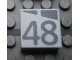 Part No: Mx1022Apb204  Name: Modulex, Tile 2 x 2 (no Internal Supports) with Dark Gray Slopes and Calendar Week Number 48 Pattern