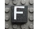 Lot ID: 407657459  Part No: Mx1022Apb006  Name: Modulex, Tile 2 x 2 (no Internal Supports) with White Capital Letter F Pattern