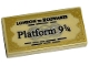 Lot ID: 414307455  Part No: 3069pb0974  Name: Tile 1 x 2 with Black 'LONDON TO HOGWARTS' and 'Platform 9 3/4' Train Ticket with Gold Edges Pattern