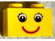Part No: 3004pb086  Name: Brick 1 x 2 with Eyes with Eyelashes and Red Smile Pattern