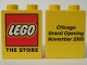 Part No: 4066pb001  Name: Duplo, Brick 1 x 2 x 2 with The Lego Store Chicago 2000 Opening Pattern
