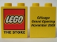 Lot ID: 511268299  Part No: 4066pb001  Name: Duplo, Brick 1 x 2 x 2 with The LEGO Store Chicago 2000 Opening Pattern