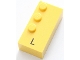 Lot ID: 367427358  Part No: 60226pb01  Name: Brick, Braille 2 x 4 with 3 Studs with Black Capital Letter L Pattern (dots-123 ⠇)