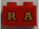 Part No: 3004pb236  Name: Brick 1 x 2 with Gold 'RA' (RAILROAD) on Red Background Pattern (Sticker) - Set 71044