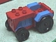 Part No: 4818c03  Name: Duplo Farm Tractor with Black Wheels, Blue Engine and Fenders, and Red Hitch