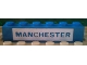 Part No: 3009pb037  Name: Brick 1 x 6 with Blue in White 'MANCHESTER' Pattern