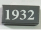 Part No: 3069pb0679  Name: Tile 1 x 2 with White '1932' on Dark Bluish Gray Background Pattern (Sticker) - Set 60097
