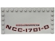 Part No: 6178pb055  Name: Tile, Modified 6 x 12 with Studs on Edges with Black and Red 'U.S.S. ENTERPRISE NCC-1701-D' Pattern