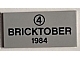 Lot ID: 150387359  Part No: 87079pb0013  Name: Tile 2 x 4 with Black Number 4 in Circle and 'BRICKTOBER 1984' Pattern