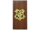Part No: 87079pb1375  Name: Tile 2 x 4 with Gold and Black Hogwarts Crest Pattern (Sticker) - Set 76425