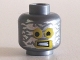 Part No: 3626cpb1113  Name: Minifigure, Head Alien with Robot Yellow Eyes and Mouth and Aluminum Foil Splotches Pattern - Hollow Stud