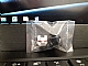 invID: 303250529 P-No: 10908pb15  Name: Minifigure, Visor Top Hinge with Silver Face Shield, Red Eyes, Black Trapezoid Pattern