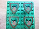 invID: 332876591 P-No: 3846p48  Name: Minifigure, Shield Triangular  with Forestmen Elk / Deer Head on Green Background Pattern