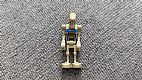 invID: 407159400 M-No: sw0065  Name: Battle Droid Pilot - Tan Torso with Blue Insignia, Angled Arms